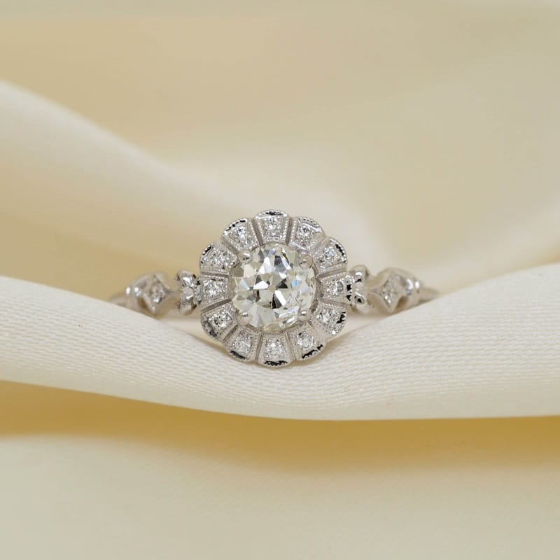vintage inspired 1.24 ct tw european cut diamond in 14k white gold halo engagement ring