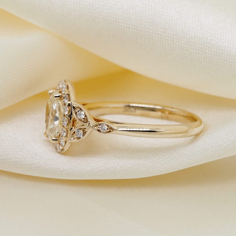 Oval Diamond Halo Flower Engagement Ring