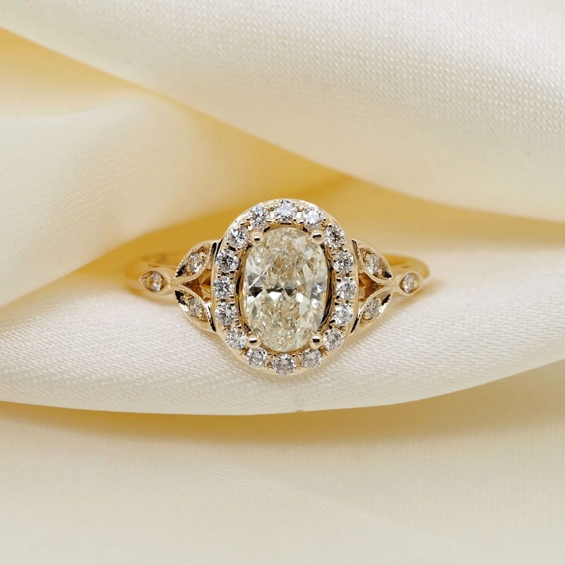 Oval Diamond Halo Flower Engagement Ring