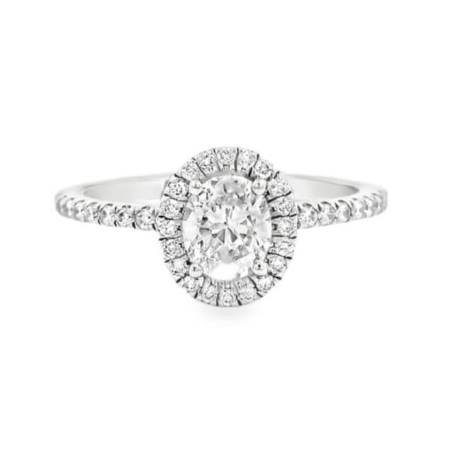Gia Certified Oval Diamond Halo Engagement Ring in 14-Karat White Gold.