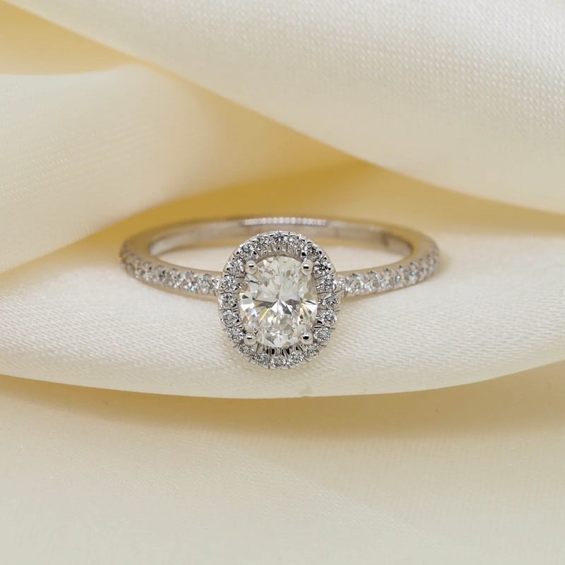 Gia Certified Oval Diamond Halo Engagement Ring in 14-Karat White Gold.