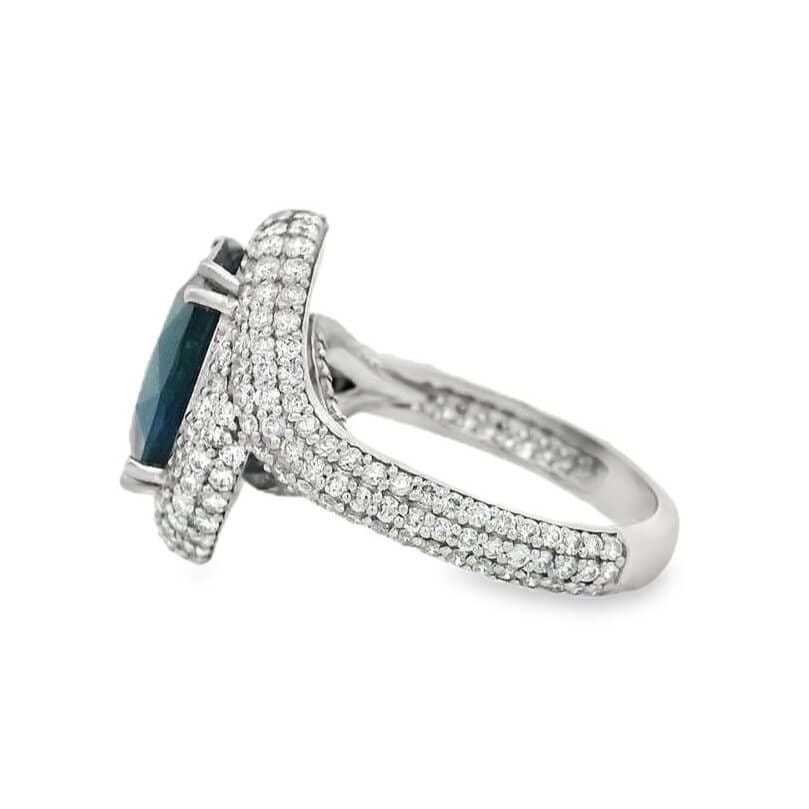 Platinum 6.11 Carat Blue Sapphire Pavé Halo Statement Ring